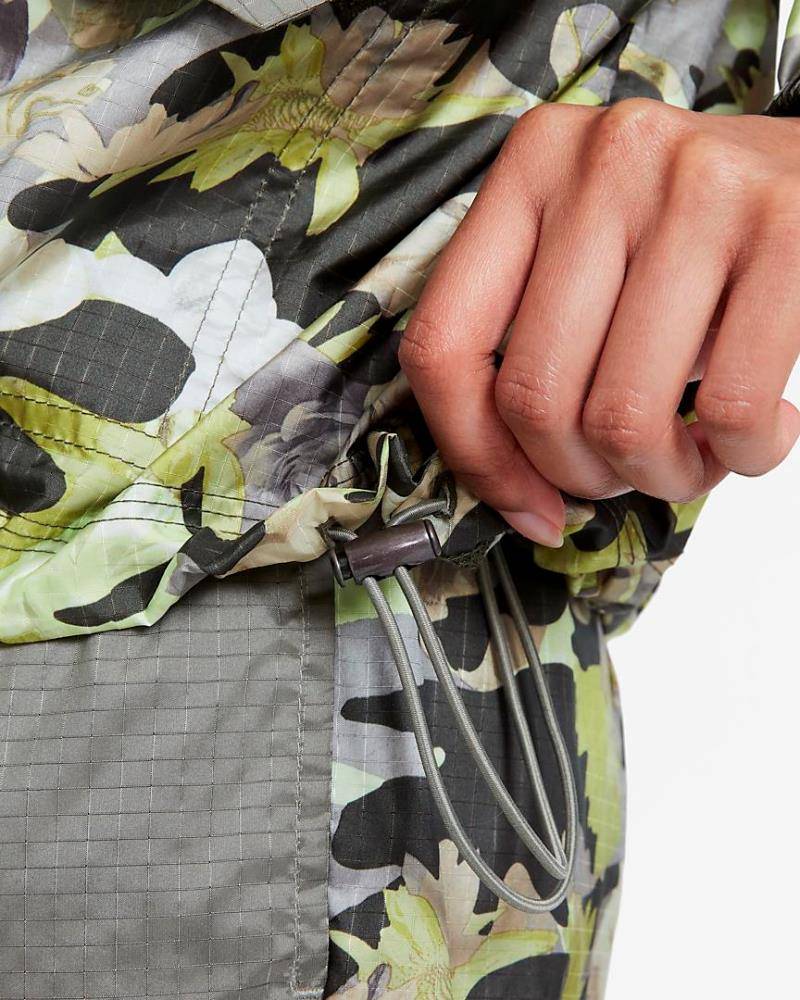 NIKE WOMENS WOVEN ALL-OVER-PRINT P&G JKT