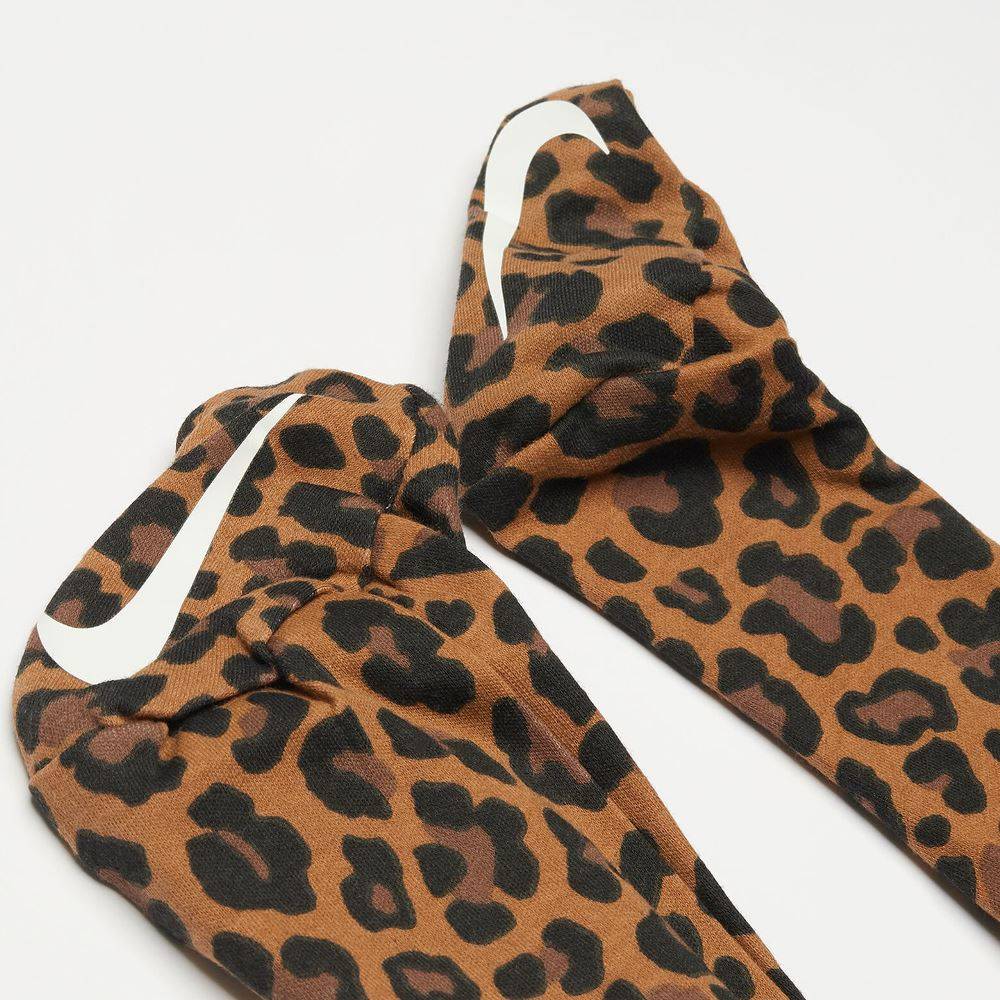 NIKE NEWBORN LEOPARD FOOTED COVERALL