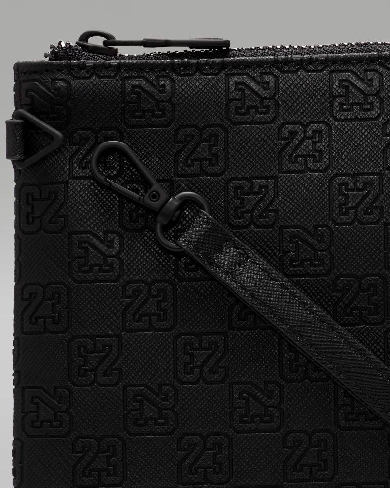NIKE JORDAN MONOGRAM POUCH