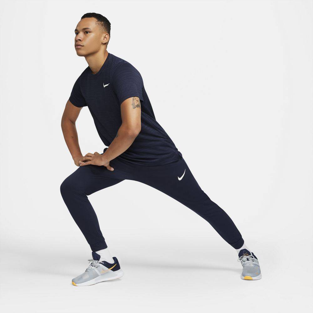 NIKE DRI-FIT TAPERED TRAINING PANTS