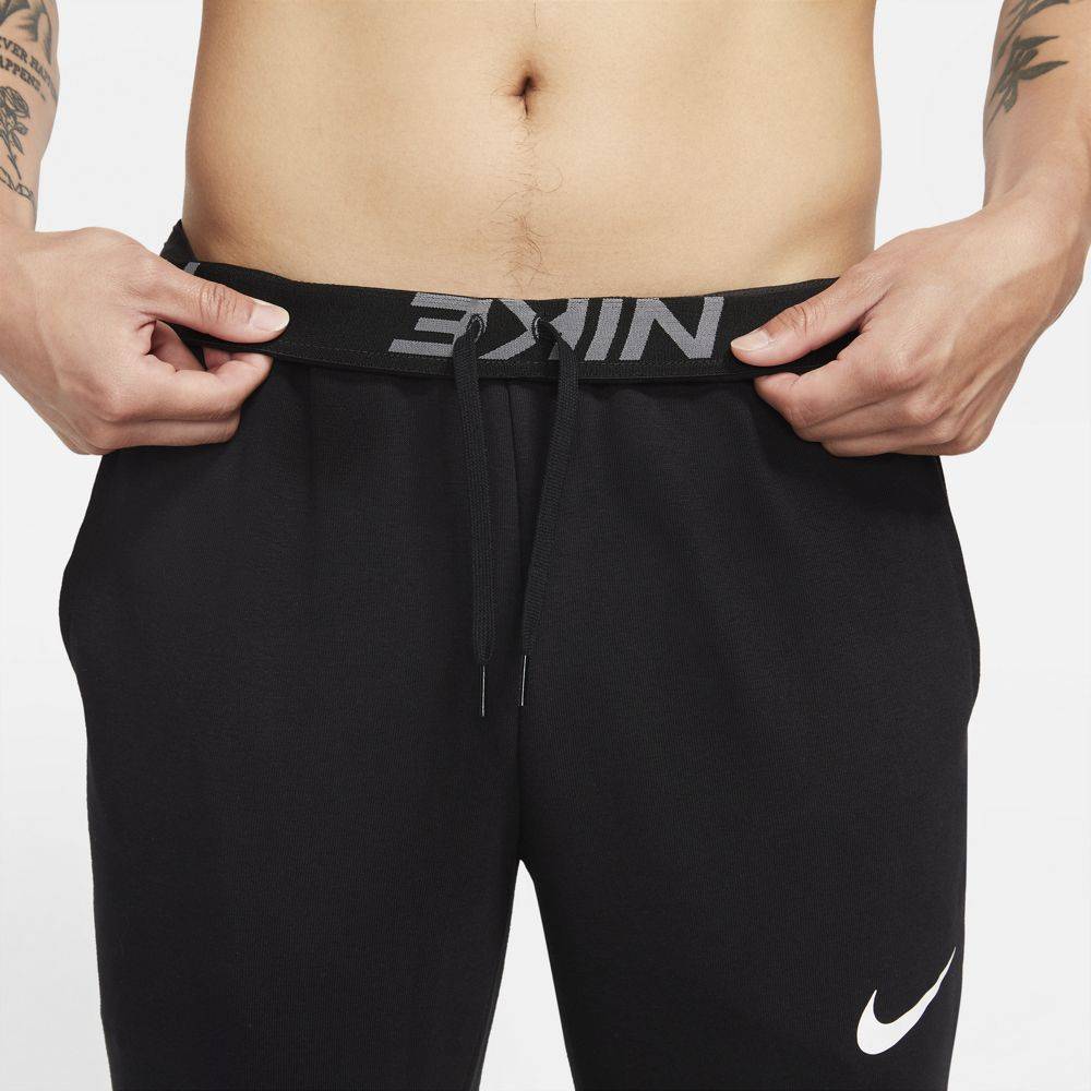 NIKE DRI-FIT TAPERED TRAINING PANTS