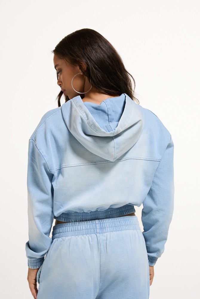 JUICY COUTURE LIGHT WASH DENIM FLEECE SMOCKED HOODIE