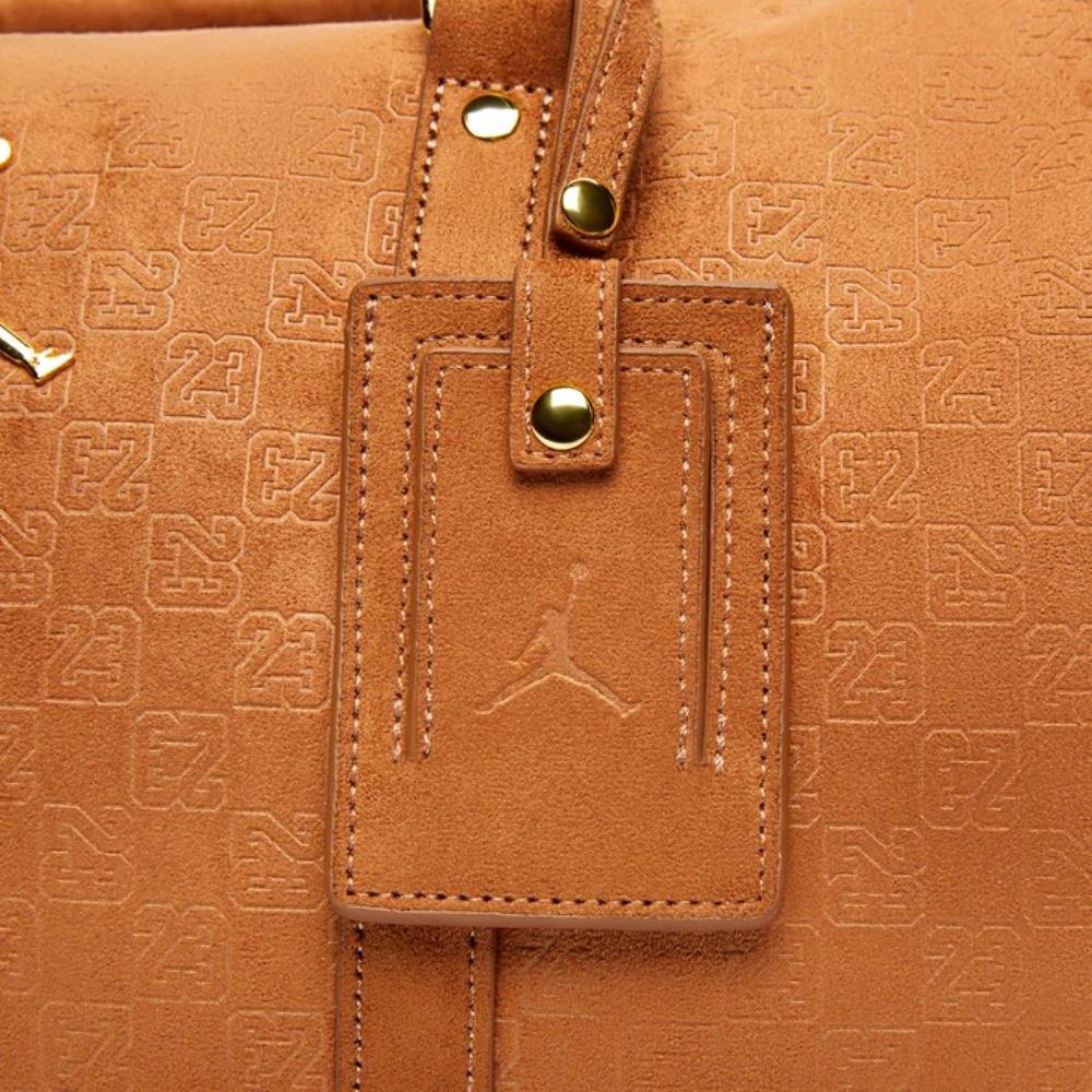 NIKE JORDAN SUEDE MONOGRAM DUFFLE